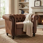 Poltrona Chesterfield moderna, Poltrona Club con braccioli a voluta, Borchie decorative e gambe in legno massello